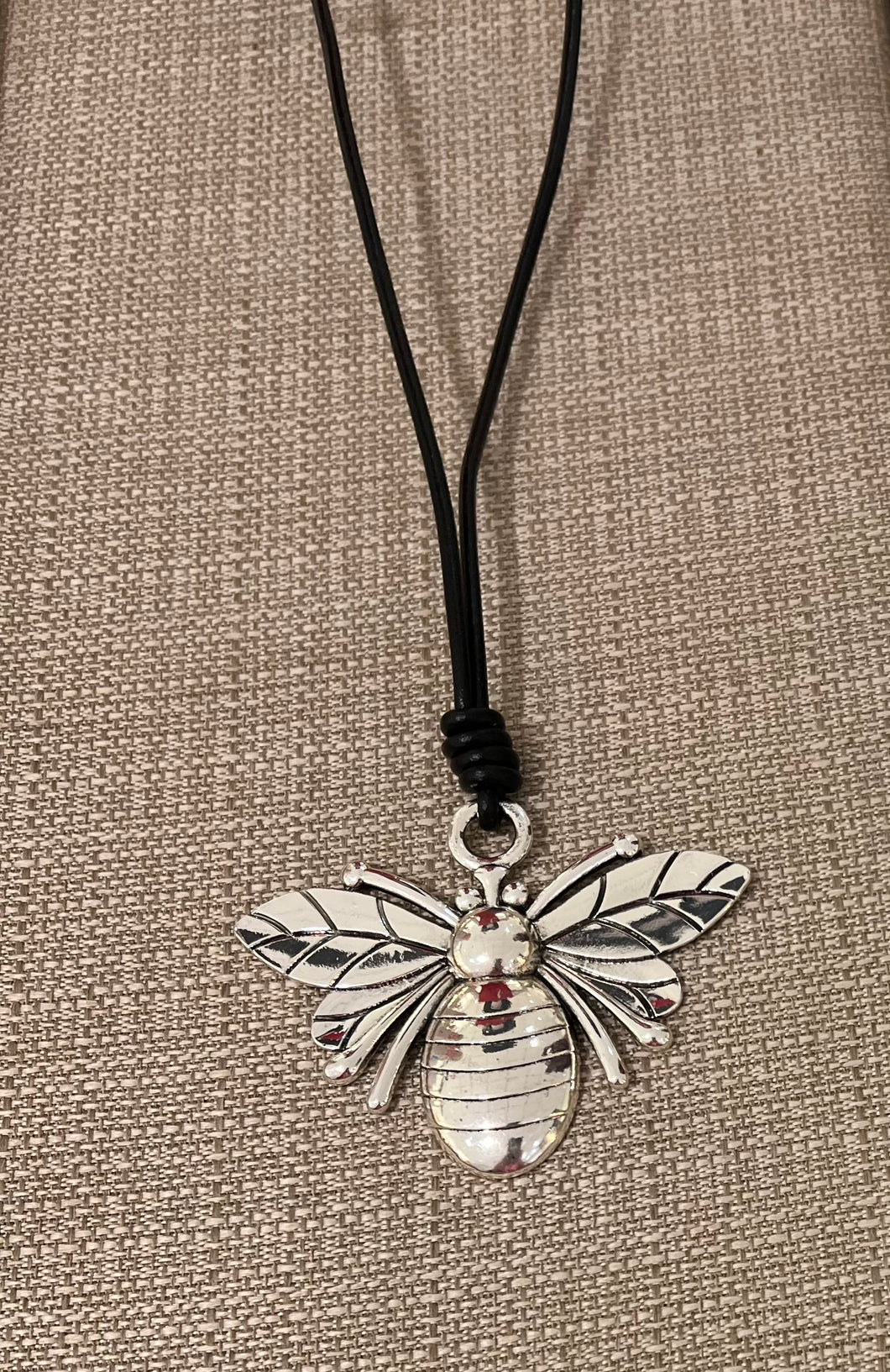 A Leather with charm necklace