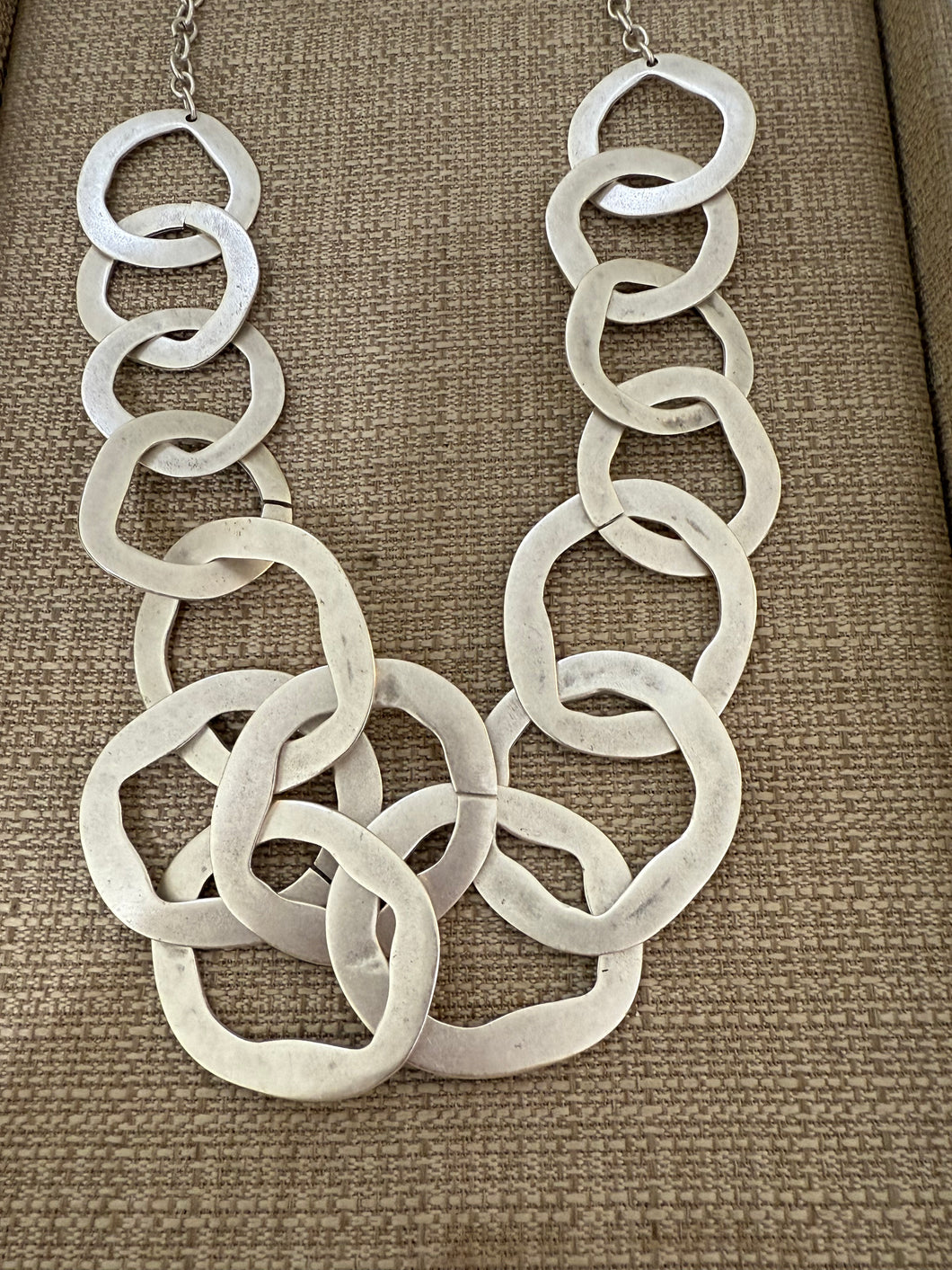 A silver circle necklace